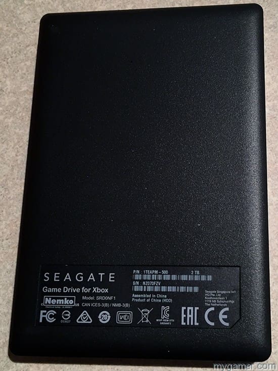 The back is black but has the strange alien symbols written on it